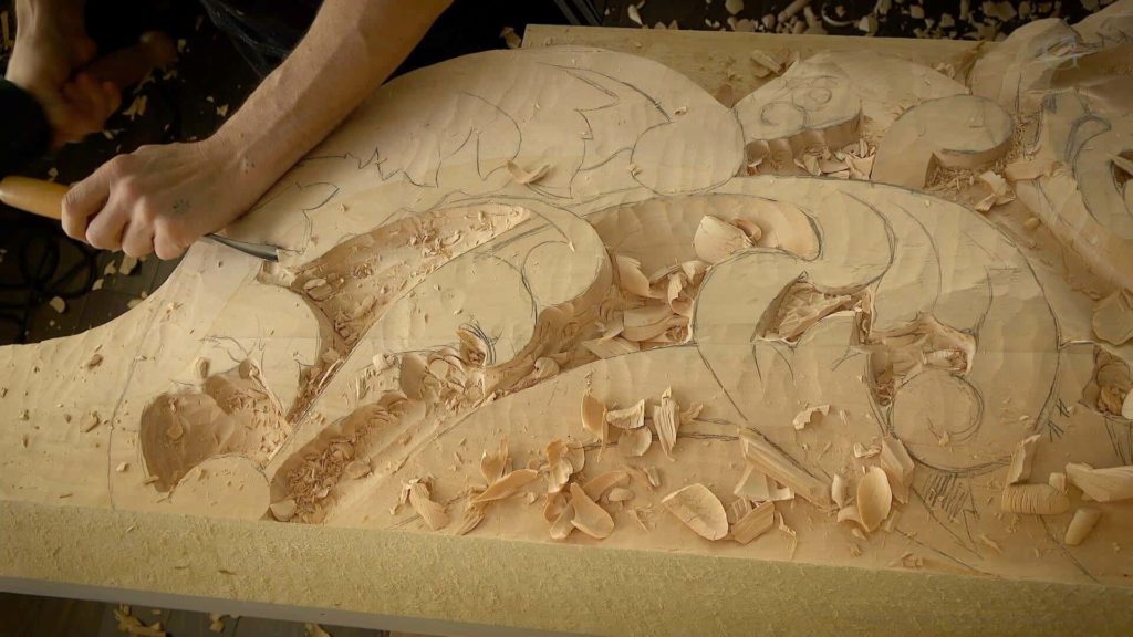 In this woodcarving lesson video, Alexander Grabovetskiy showcases the intricacies of carving Baroque style in Venetian overhead room sections, while teaching the art of traditional, classical wood carving techniques. Wood Carving Course online - Carving Authentic Venice 15th Century room. It is all about being authentic to the original 15th-century wood carving. wood carving course wood carving courses decoy carving classes woodworking school cabinet making school wood carving supplies wood carving class wood carving school wood carving schools wood carving courses for beginners wood carving videos free wood carving lessons near me wood carving classes online wood carving schools wood carving workshops wood carving programs wood carving online shop Woodcarving, Wood Carving, Woodcarving School, School of Woodcarving, School of Wood Carving wood carving course wood carving courses decoy carving classes woodworking school cabinet making school wood carving supplies wood carving class wood carving school wood carving schools wood carving courses for beginners wood carving videos free wood carving lessons near me wood carving classes online wood carving schools wood carving workshops wood carving programs wood carving online shop https://www.instagram.com/woodcarvergrabovetskiy/ Design for Wood Carving is not the same as for Fine art or even Sculpture. Fine art is 2D World vs Sculpture and Wood carving is 3D world. Wood Carving is also a type of Sculpture. But if You compare a Clay Modeling and Wood Carving. Modeling clay is the art of ADDING ON and Wood Carving is an Art of DEDUCTION. And art of deduction is a little more complicating. You can deduct with Your Carving tool just a 1/16” too much and Your work is "gone with the wind”. To Design for wood carving We need to Think a little different. And the same questions should be always in our heads- What tools do I have and how I will carve what I am designing? How deep can my tool travel inside of my piece of wood and how it will turn. Design for Wood Carving is a science and it is based on a laws. During this Class we will discover some of the laws or Principles and answer a really important Design questions. The Law of Space. - How to emphasize parts of a Design - "The Big Idea" position in Space The Law of Main Movement - How to be "on the same page" with Human Brain. Baroque diagonal vs Sinister diagonal in Artistic Design. The Law of Armature- How to Structure over all Design and be “Kosher” (clean) in it. The Law of Golden Ratio - How to implement Fibonacci Sequence - the Art Secret for Pleasing Human eye The Law of Arabesque - How to implement Natural Flowing Movements in Design The Law of Rhythm in Design. How to apply what is known to Music world to Design for Wood Carving. Wood Carving Lessons Best Wood Carver in the World Wood Carving Master Classes Wood Carving Courses