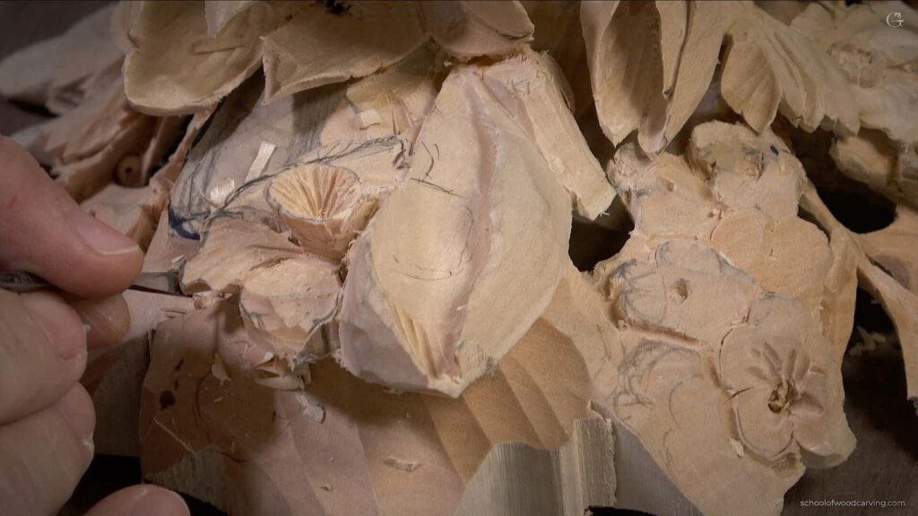In this woodcarving lesson, Alexander Grabovetskiy teaches the methods of Grinling Gibbons to create a stunning wall decoration. Learn how to carve intricate flowers, leaves, and other details in the style of the famous woodcarver.