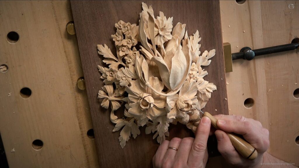 Alexander Grabovetskiy Teaches how to Carve Wood. Unleash your creativity and hone your woodcarving skills with Alexander Grabovetskiy's in-person Maine Woodcarving class. His expertise in the intricate and delicate Grinling Gibbons-style will help you create stunning wood carvings that are truly unique. German: Alexander Grabovetskiy lehrt Holzschnitzerei. Entfesseln Sie Ihre Kreativität und verfeinern Sie Ihre Holzschnitzfähigkeiten mit Alexanders In-Person Maine Woodcarving-Kurs. Seine Expertise im filigranen und delikaten Grinling Gibbons-Stil hilft Ihnen, atemberaubende Holzschnitzereien zu schaffen, die wirklich einzigartig sind. Russian: Александр Грабовецкий учит резьбу по дереву. Разблокируйте свою креативность и оттачивайте свои навыки резьбы по дереву с Александром Грабовецким на личном уроке по резьбе по дереву в штате Мэн. Его опыт в тонком и изысканном стиле Гринлинга Гиббонса поможет вам создавать потрясающие резные изделия из дерева, которые действительно уникальны. Spanish: Alexander Grabovetskiy enseña a tallar madera. Desata tu creatividad y perfecciona tus habilidades de tallado en madera con el curso en persona de Alexander Grabovetskiy en Maine Woodcarving. Su experiencia en el intrincado y delicado estilo Grinling Gibbons te ayudará a crear impresionantes tallados en madera que son realmente únicos. Chinese: 亚历山大·格拉博韦茨基教你如何雕刻木材。通过亚历山大的现场缅因州木雕课程,释放你的创造力,磨练你的木雕技巧。他对于Grinling Gibbons风格的熟练掌握将帮助您创建独特而惊人的木雕作品。 Japanese: アレクサンダー・グラボヴェツキーによる木彫りのクラス。アレクサンダー・グラボヴェツキーの直接指導の下、クリエイティブな能力を解放し、ミーン州における木彫りクラスで木彫りの技術を磨き上げましょう。グリンリング・ギボンスのスタイルの緻密で繊細な技術に精通している彼の知識を生かして、本当にユニークな見事な木彫作品を作成できます。