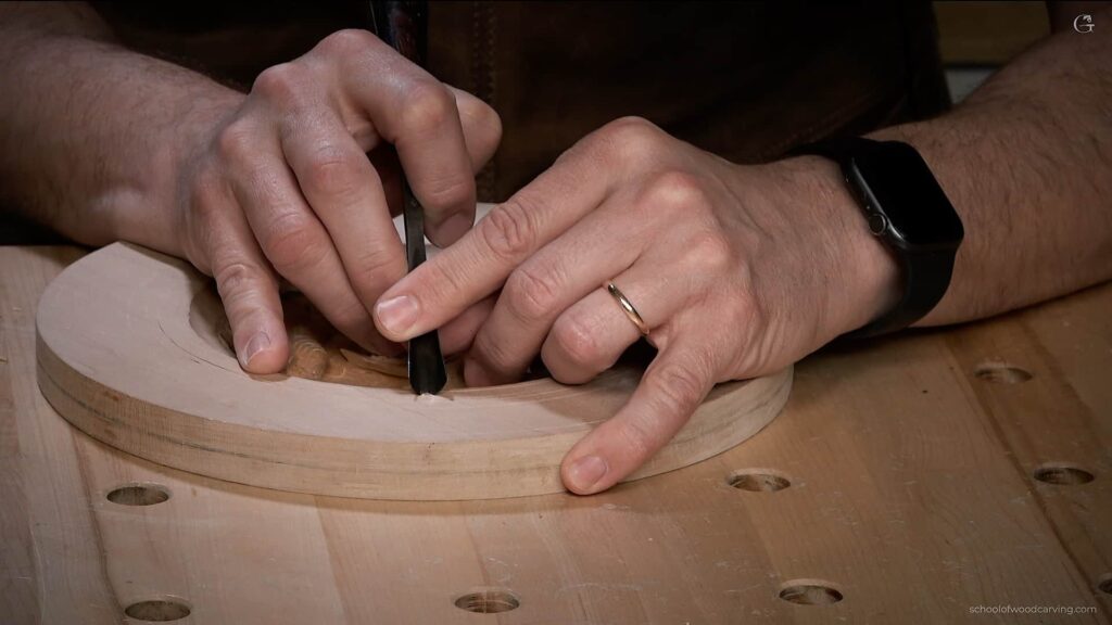 Witness the artistry of Alexander Grabovetskiy as he skillfully carves a butterfly on a wooden plate using a carving knife. The process demands patience, accuracy, and mastery in order to capture the delicate details of the butterfly's wings and antennae. The final product is a stunning piece of wall art, displaying a mesmerizing butterfly that highlights the artist's wood carving expertise.