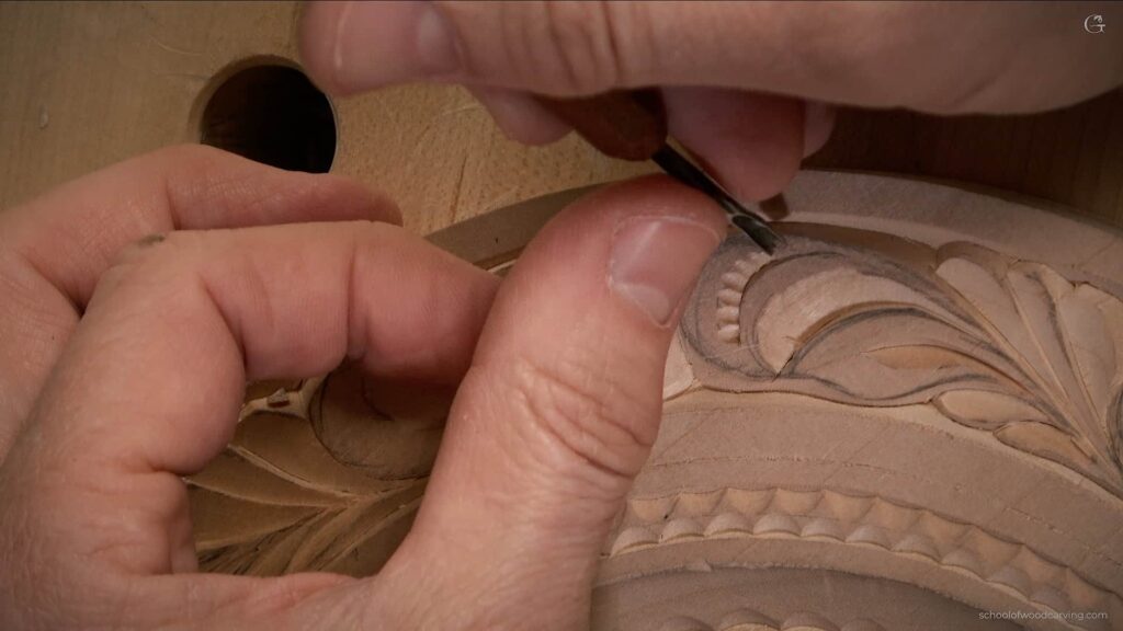 Alexander Grabovetskiy's exquisite butterfly plate, a testament to his wood carving prowess.