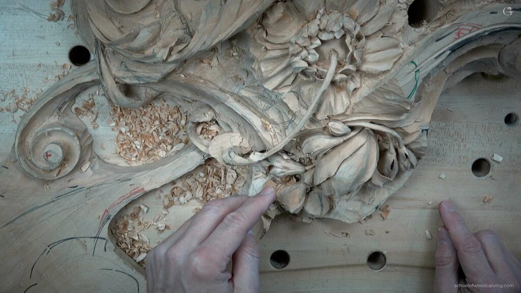 Detailed carving of intricate patterns, inspired by the Grinling Gibbons technique.