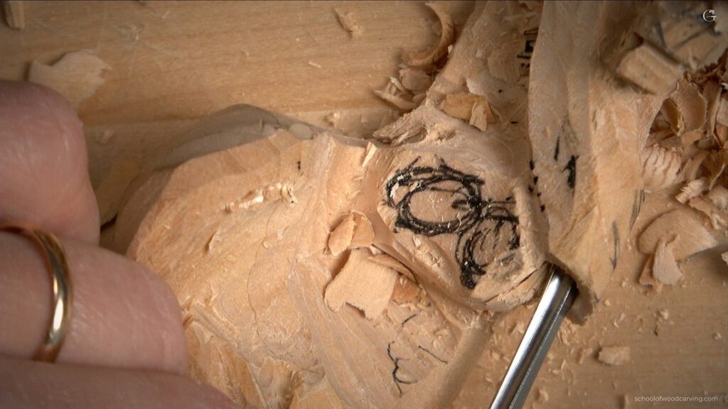 Expert craftsman Alexander Grabovetskiy immersed in Grinling Gibbons style wood carving