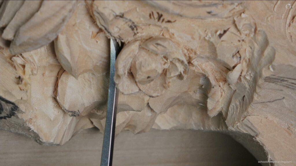 An intricate image showcasing a hand deftly engaged in the craft of woodcarving. The concentration of the craftsman is palpable as they employ a sharp, specific tool to delicately etch the wood. The sheen of the tool's metal tip gleams as it effortlessly pierces the wood, unveiling the hidden charm of the material. This woodcarving piece in progress is an intriguing fusion of natural form and human inventiveness. Each fragment taken away from the woodcarving gradually uncovers more of the intended design, metamorphosing a mundane piece of wood into an artistic masterpiece. The grain of the woodcarving provides a sense of depth and texture to the image, giving it an almost tactile essence, as though one could reach out and touch the sleek wood. Wood shavings from the woodcarving are dispersed around the workspace, bearing witness to the effort and devotion poured into this masterpiece. The craftsman's hand, steering the tool with remarkable precision, represents years of mastery in woodcarving. The meticulousness and patience required for this craft are commendable and apparent in each incision made into the woodcarving. The backdrop of the image is blurred, focusing the viewer's attention on the woodcarving. It provides a close-up view into the artistic process, emphasizing not just the end result but the journey of creating a woodcarving. The illumination in the image highlights the woodcarving, accentuating the vibrant tones of the wood. It also projects minute shadows, enriching the depth of the woodcarving and enhancing its three-dimensional appeal. This image encapsulates the allure of woodcarving – a harmonious blend between nature's bounty and human creativity, morphing a simple chunk of wood into something truly magnificent.