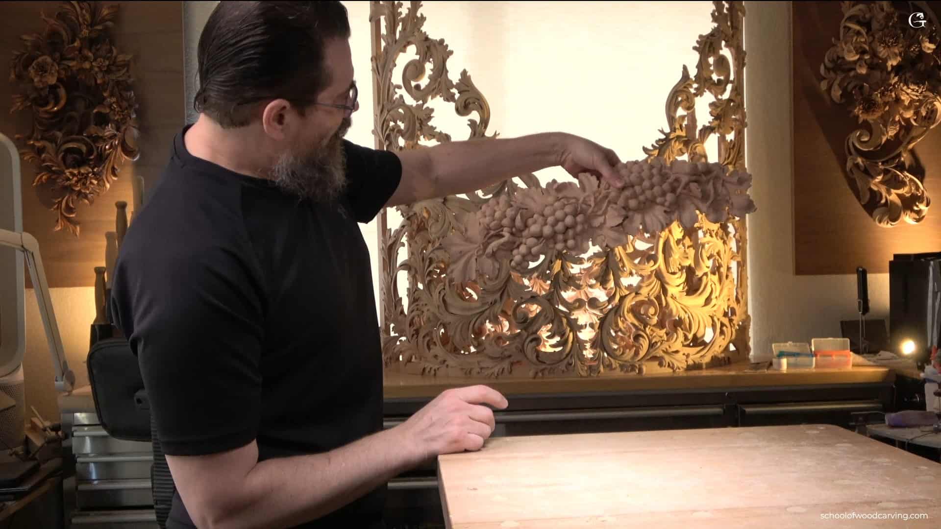 Master wood carver Alexander Grabovetskiy teaching in his studio